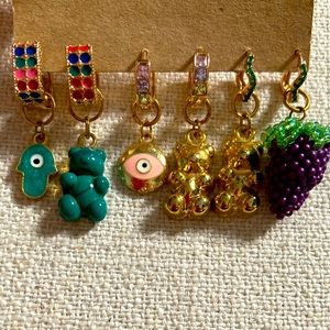 Gold plated earrings with handmade charms.